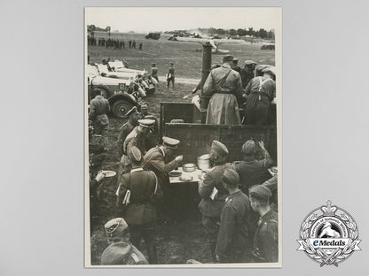 a_large_h._hoffmann_press_photo_of_ah_in_the_field_with_army/_ss_troops_b_3343