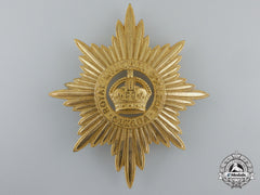 A Second War Period Canadian Royal Military College Pith Helmet Cap Badge