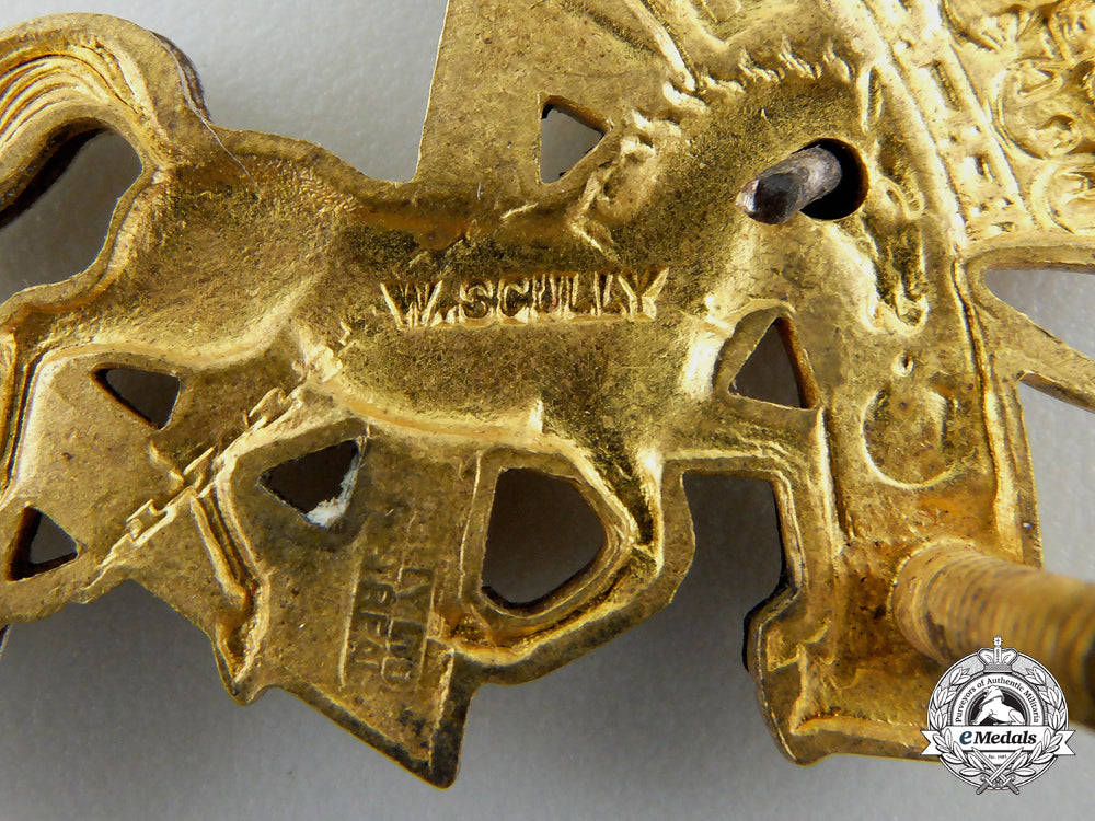 a_second_war_royal_canadian_electrical_and_mechanical_engineers_officer's_cap_badge_b_421
