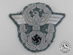 A German Police Officer's Bullion Sleeve Eagle; Uniform Removed