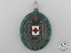 An Austrian Honour Decoration Of The Red Cross; Silver Medal With War Decoration