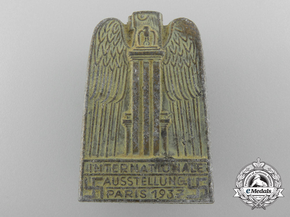 an1937_international_paris_exposition_badge_b_8829