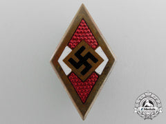 An Hj Golden Honor Badge