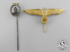 A Kriegsmarine Visor Cap And Minesweeper Badge