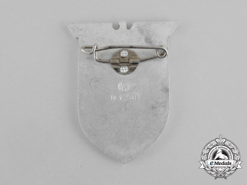 a_badge_to_commemorate_the_führer’s_speech_at_the_launch_of_tirpitz_badge_bb_1079
