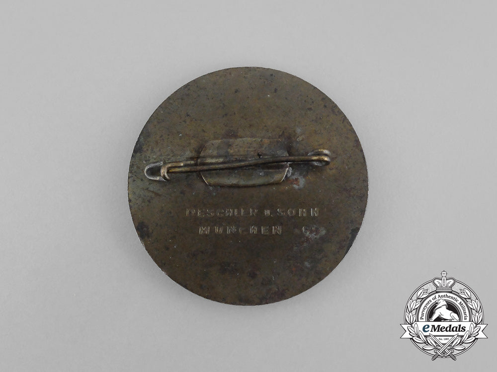 a1935_nsdap_national_party_day_badge_by_deschler&_sohn_bb_1089