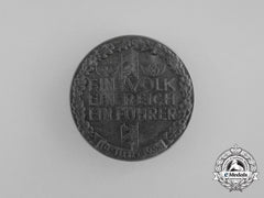 A 1933 “One Nation, One Empire, One Leader” Badge By Carl Poellath