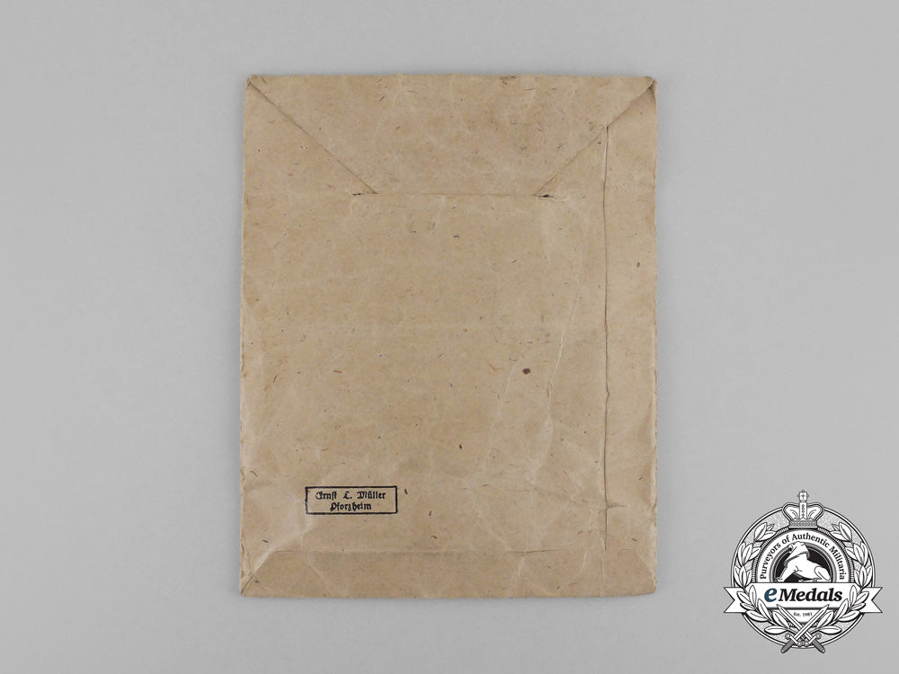 a_german3_rd_class_cross_of_honour_of_the_german_mother_with_its_packet_by_ernst&_müller_bb_2406