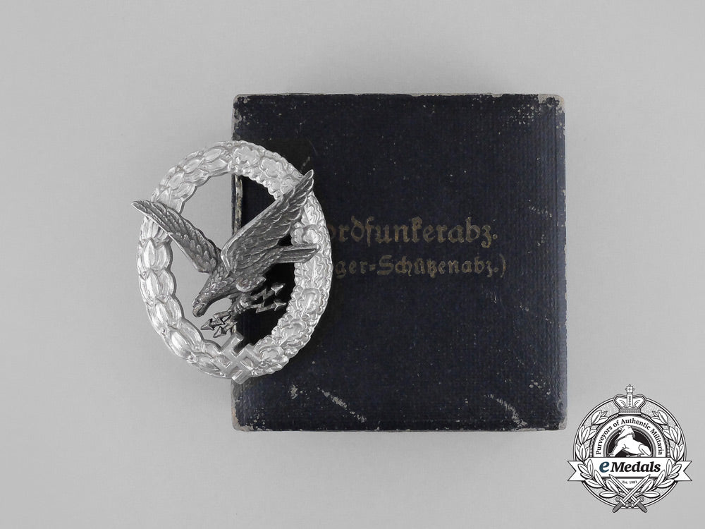 a_cased_luftwaffe_radio_operator_badge_by_hermann_aurich;_aluminum_version_bb_2666