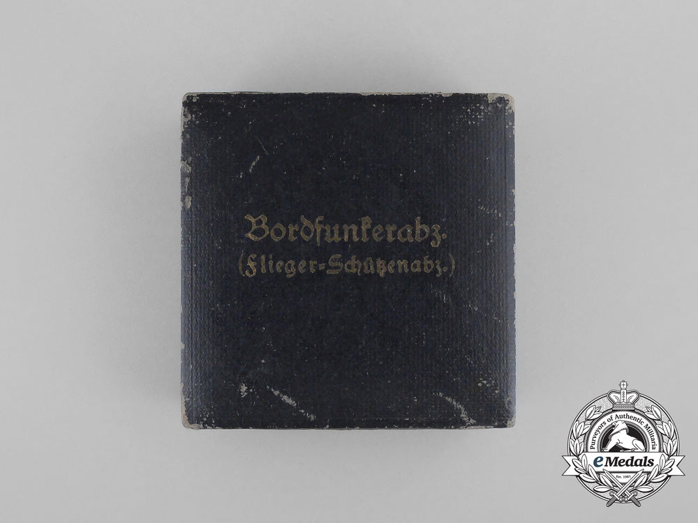 a_cased_luftwaffe_radio_operator_badge_by_hermann_aurich;_aluminum_version_bb_2667