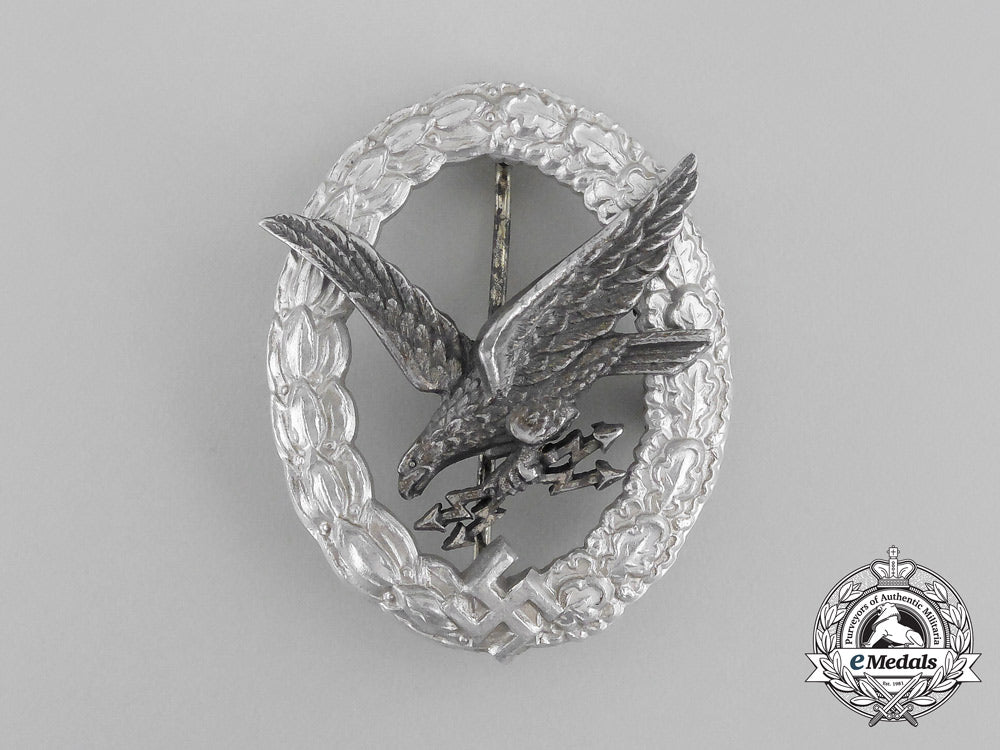 a_cased_luftwaffe_radio_operator_badge_by_hermann_aurich;_aluminum_version_bb_2668