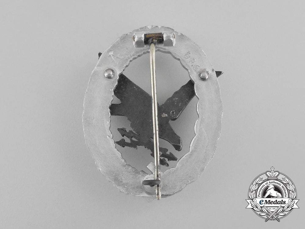 a_cased_luftwaffe_radio_operator_badge_by_hermann_aurich;_aluminum_version_bb_2669