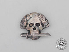 A Second War Italian Black Brigade Skull Badge