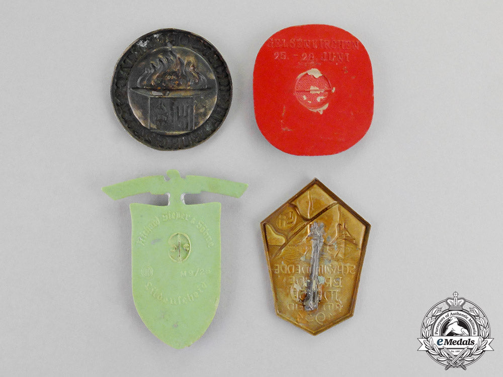 germany._a_grouping_of_four_third_reich_period_event_badges_c17-8452