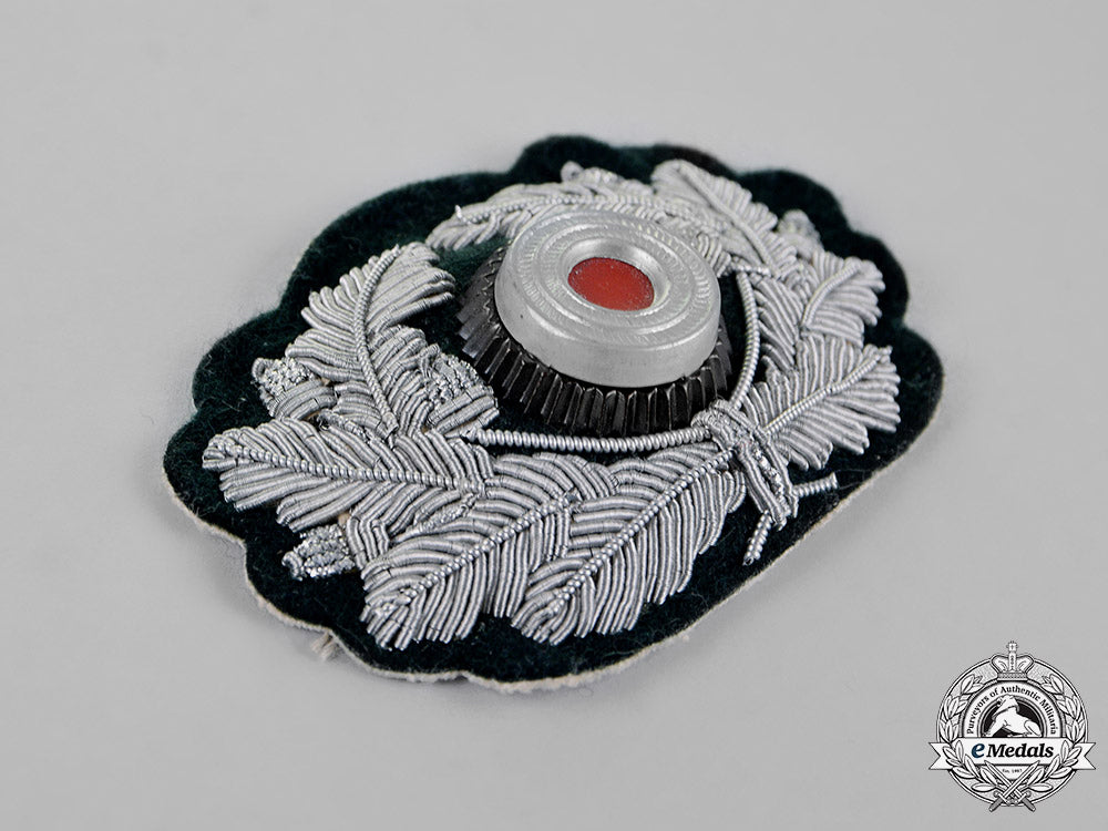 germany,_wehrmacht._an_officer’s_visor_cap_wreath_and_cockade,_bullion_version_c18-020705