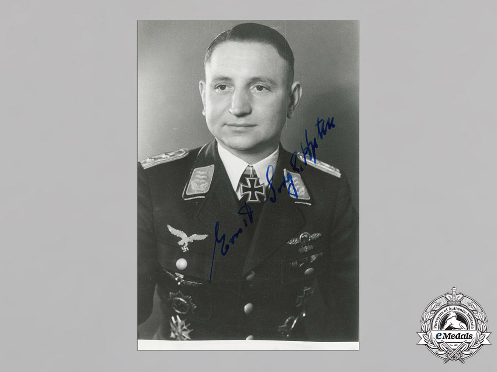 germany,_luftwaffe._a_post_war_signed_studio_portrait_of_long-_range_reconnaissance_pilot_hauptmann_ernst_sorge(_kc)_c18-021120