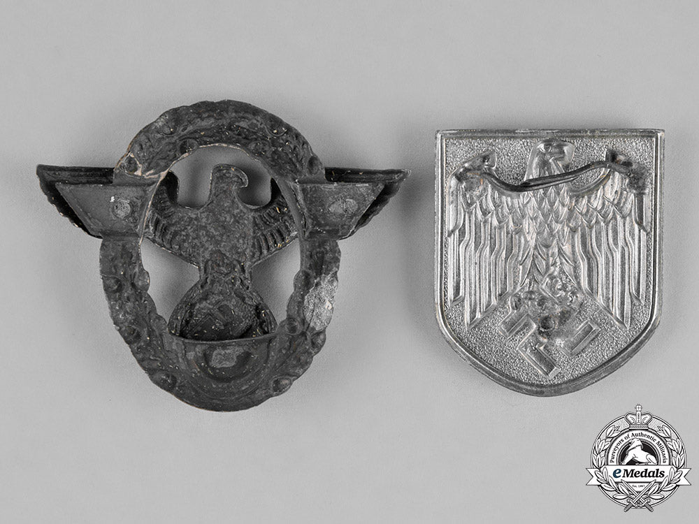 germany._a_grouping_of_four_first_and_second_war_insignia_c18-022925