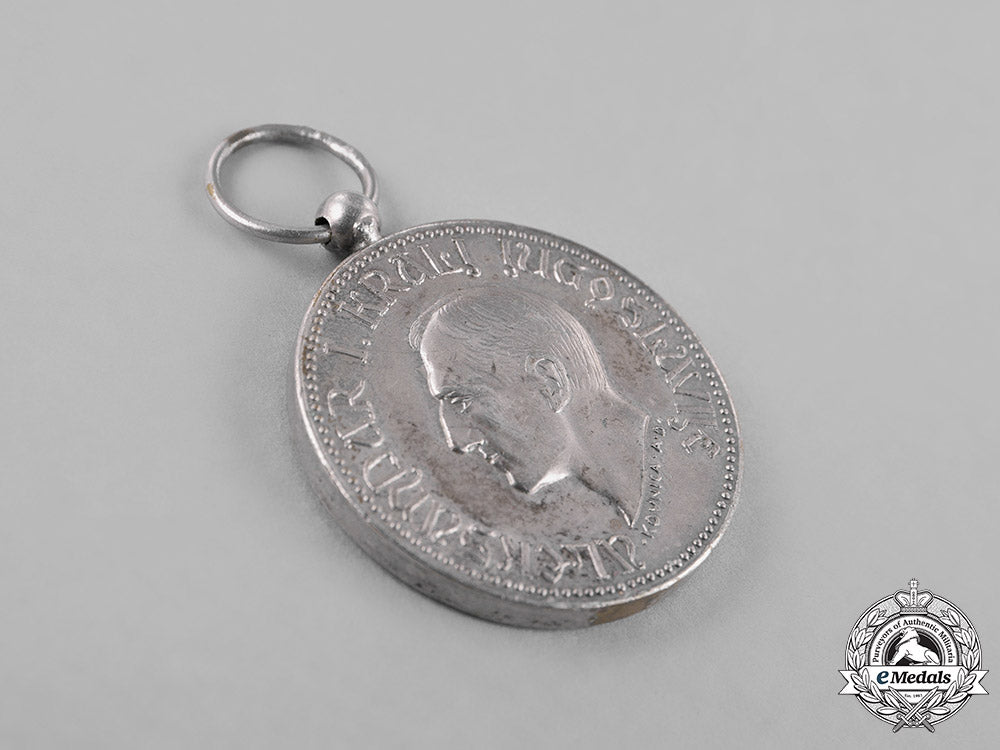 yugoslavia,_kingdom._a_royal_household_medal,4_th_class,_type_v(1927-1929)_c18-024857