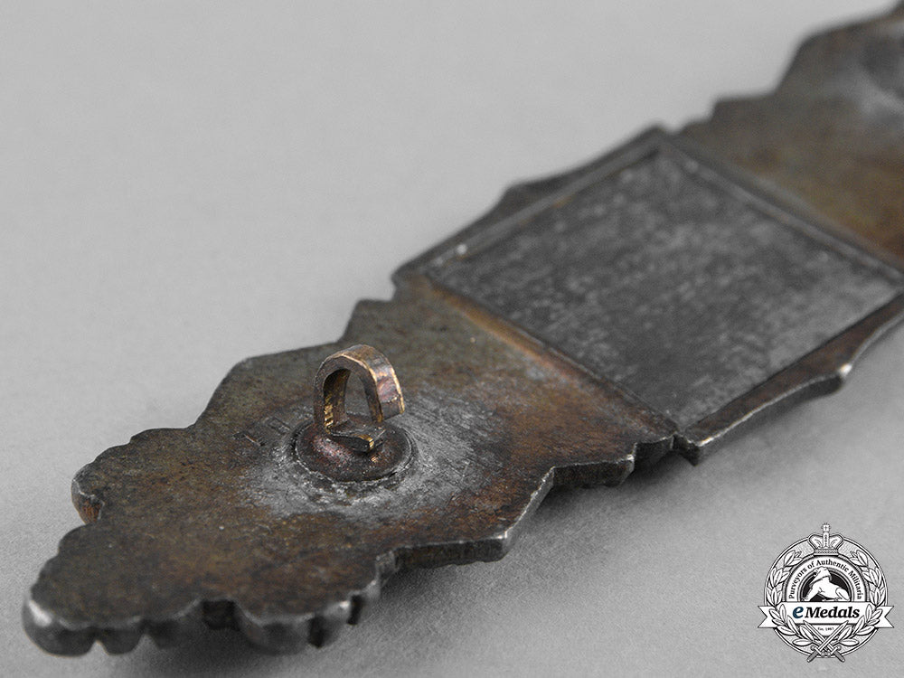 germany,_wehrmacht._a_wehrmacht_close_assault_clasp,_in_bronze,_by_funcke&_brüninghaus_c18-028171_1