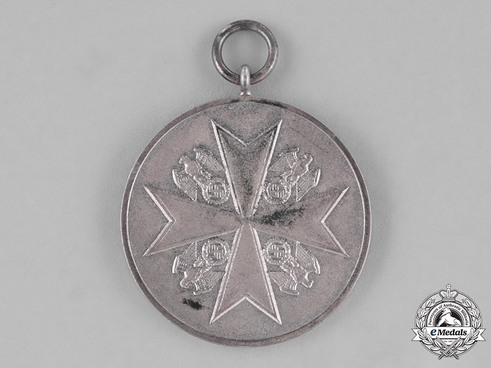 germany,_third_reich._an_order_of_the_german_eagle,_merit_medal_in_silver_by_the_official_berlin_mint_c18-034601