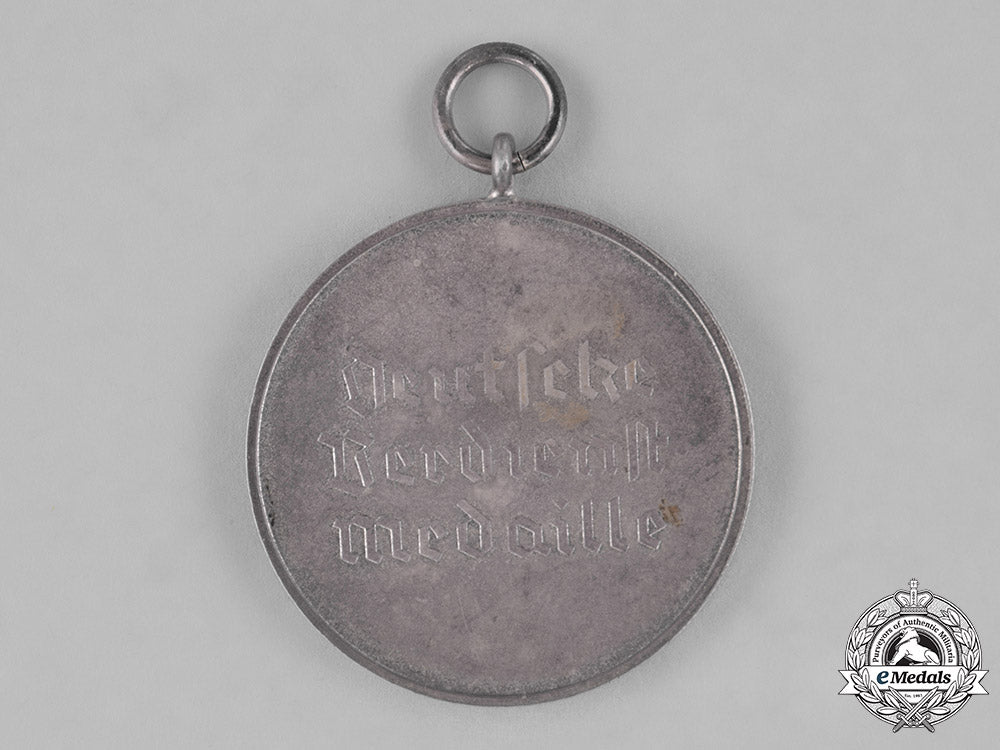 germany,_third_reich._an_order_of_the_german_eagle,_merit_medal_in_silver_by_the_official_berlin_mint_c18-034602
