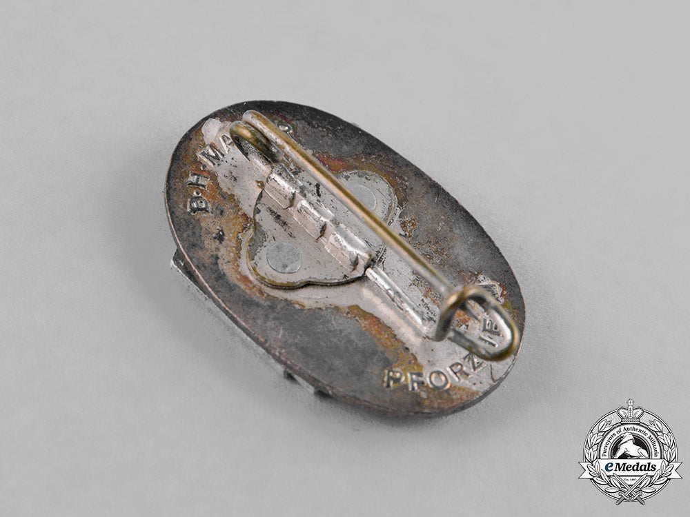 germany,_third_reich._a_group_of_third_reich_period_organization_membership_badges_c18-035667