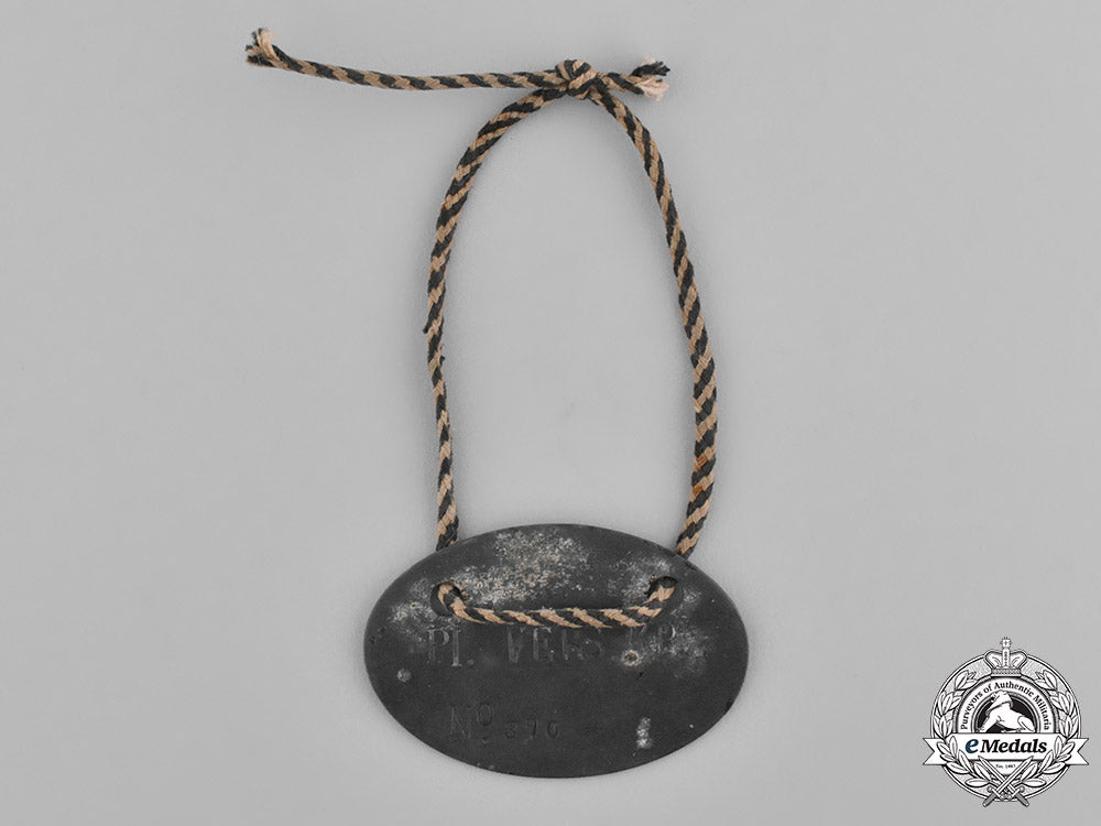 europe._a_pair_of_first_war_german_pow_identification_discs_c18-036934