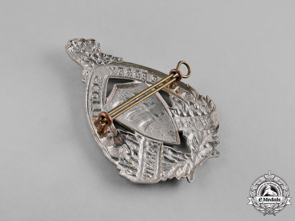 canada._a_lot_of_four_pre-_first_and_second_war_cap_badges_c18-037961