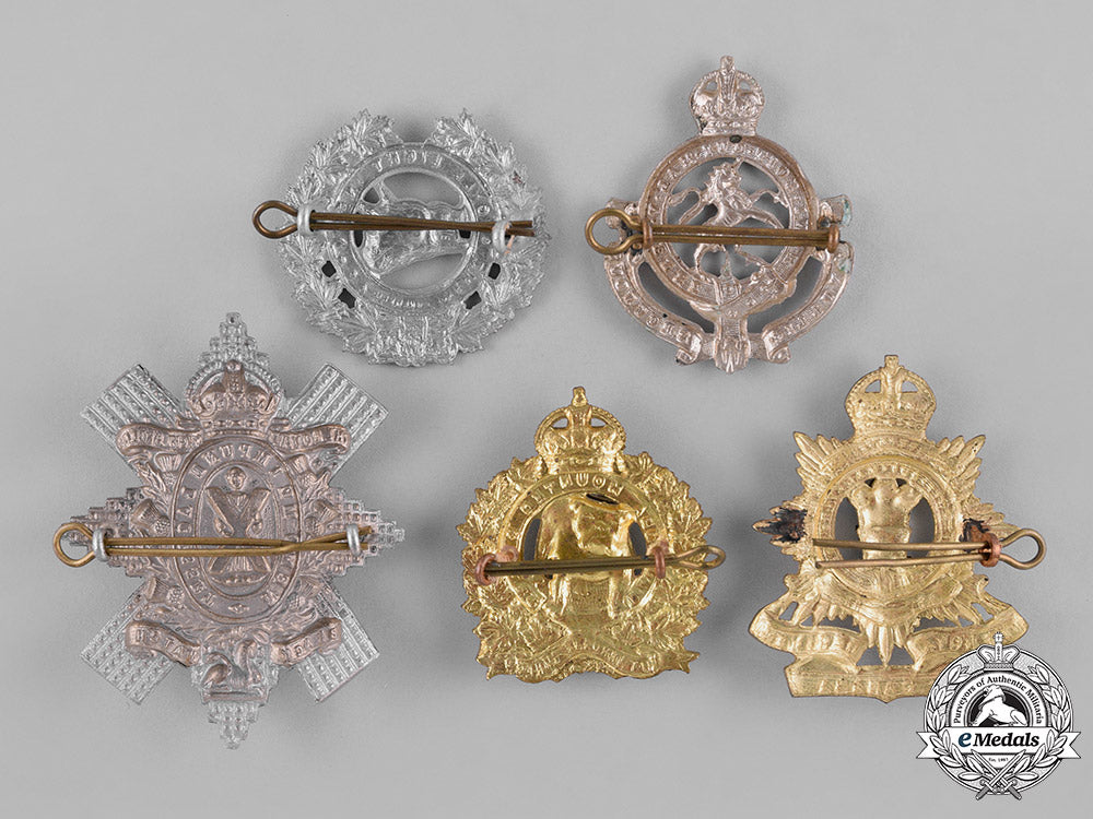 canada._a_lot_of_five_second_war_cap_badges_c18-038002