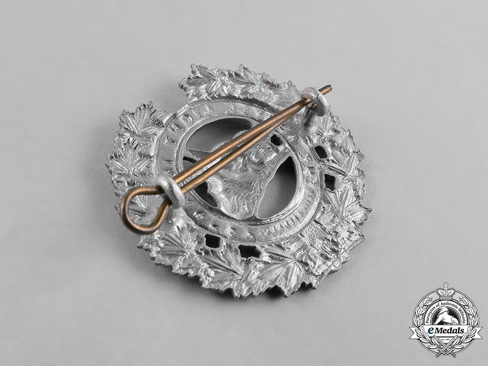 canada._a_lot_of_five_second_war_cap_badges_c18-038004
