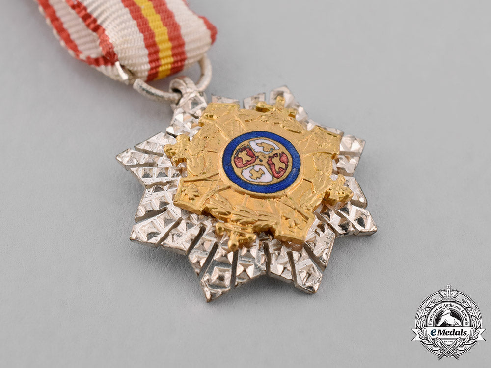 spain,_franco’s_period._a_miniature_war_cross,_c.1950_c18-038545