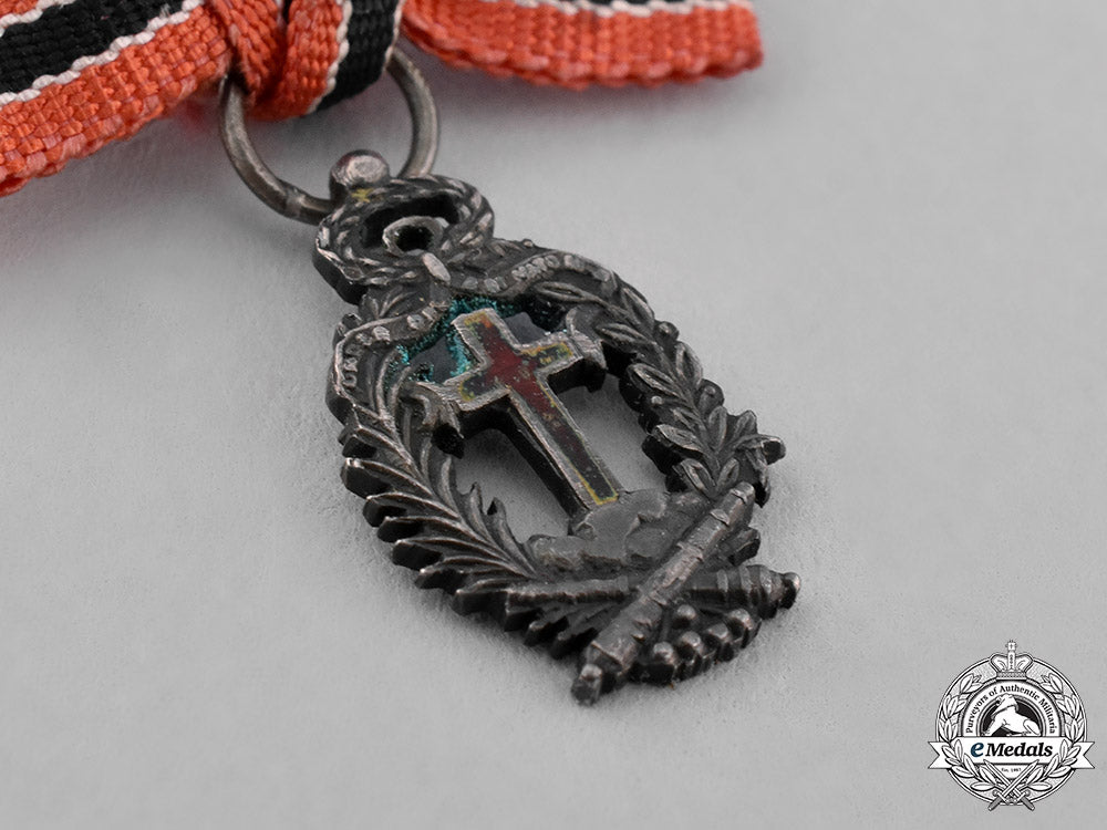 spain,_kingdom._a_miniature_order_of_the_holy_cross_and_victims_of_may2,1808,_silver_medal,_c.1900_c18-038551