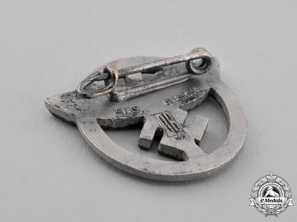 germany,_nsfk._a_national_socialist_flyers_corps_membership_badge_c18-038575