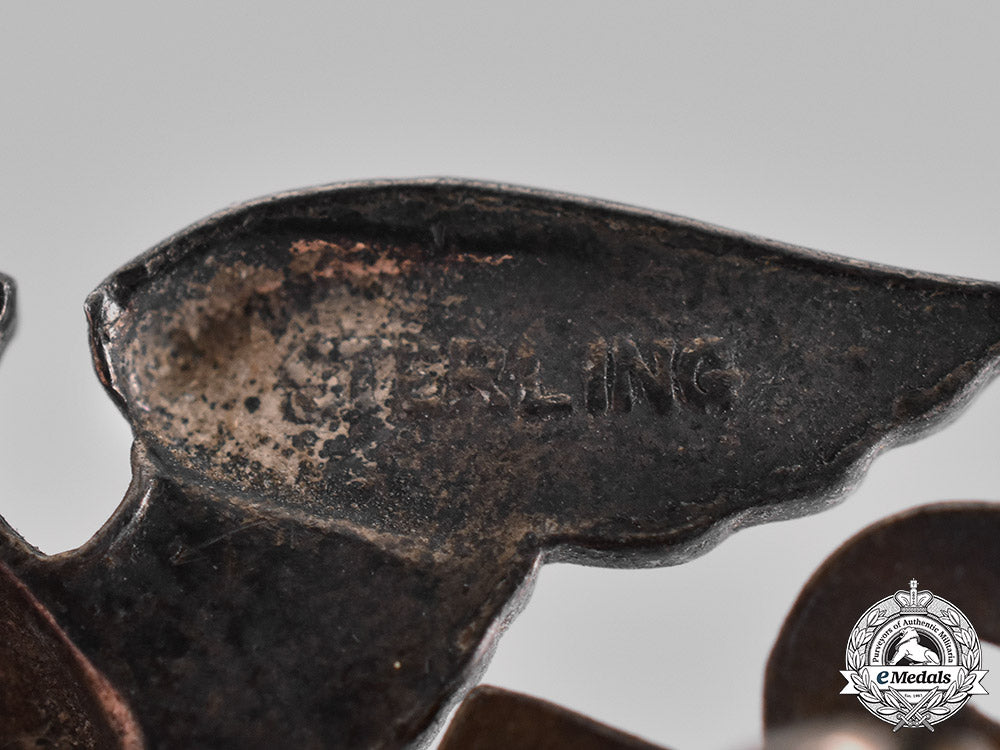 united_states._a_pair_of_united_states_navy_officer’s_cap_badges_c18-039749_1_1