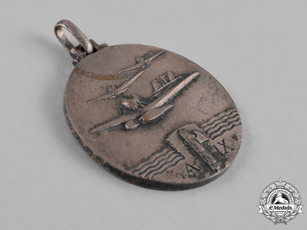 italy,_kingdom._a_flight_to_brazil_atlantic_ocean_crossing_medal,_c.1931_c18-045464