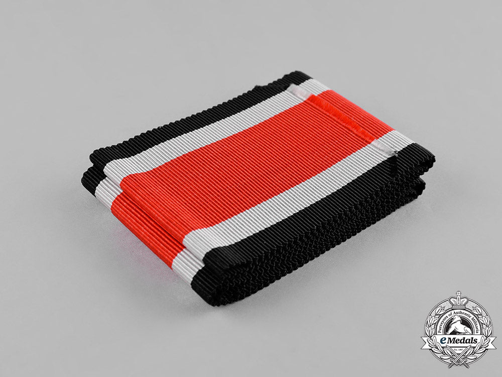 germany,_wehrmacht._an_unissued_original_ribbon_for_the1939_knight’s_cross_of_the_iron_cross_c18-045844