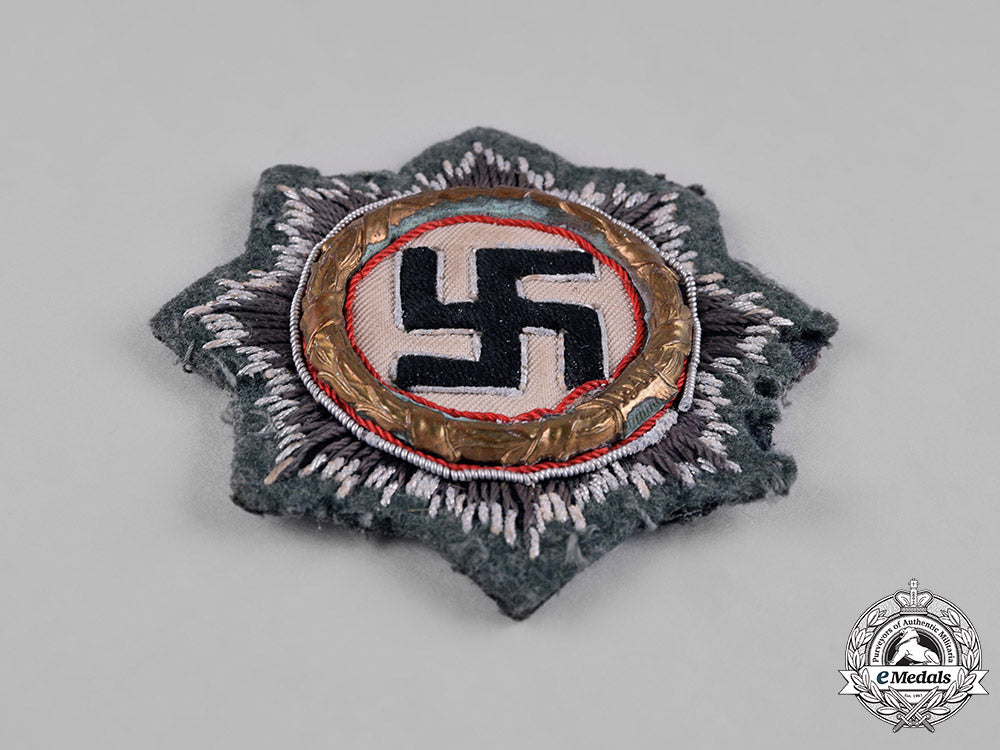 germany,_wehrmacht._a_german_cross_in_gold,_cloth_heer_version_c18-050728_1_1