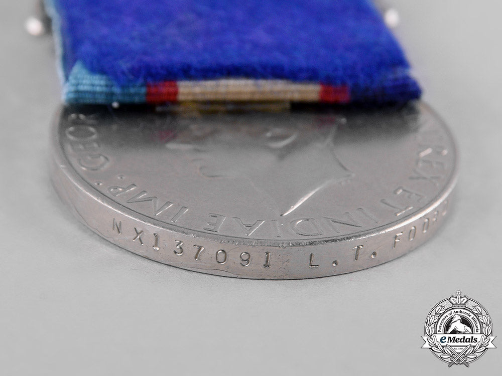 australia._a_second_war_service_medal1939-1945,_to_l.t._foord_c18-051232