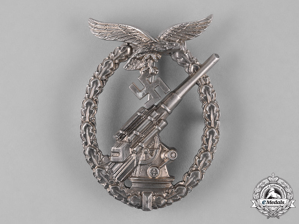 germany,_luftwaffe._a_flak_badge,_by_c.e._juncker_c18-054588