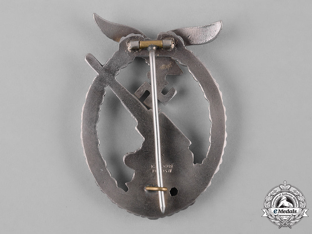 germany,_luftwaffe._a_flak_badge,_by_c.e._juncker_c18-054589