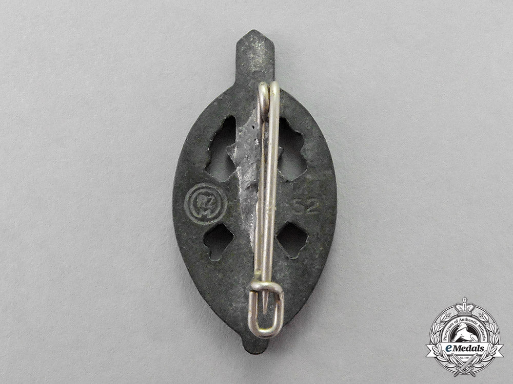 germany._four_first_and_second_war_period_badges,_pins,_and_insignia_c18-1450