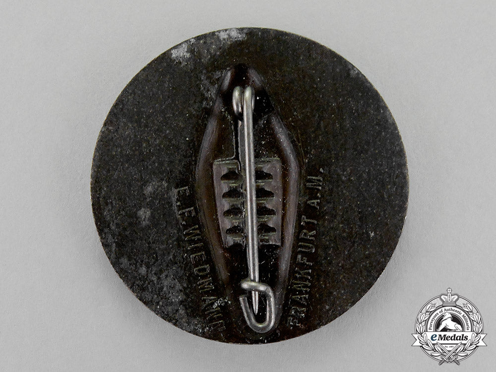 germany,_third_reich._a1937_national_day_of_labour_badge_by_e.f._wiedmann_c18-1641