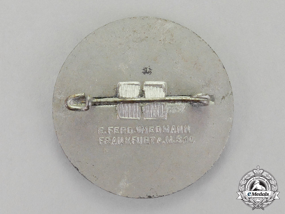 germany,_third_reich._a1939_great-_germany_national_day_of_veterans_badge_e.f_wiedmann_c18-1726