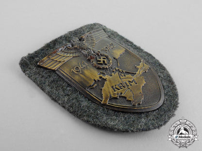 germany._a_mint1942_issue_wehrmacht_heer(_army)_issue_krim_campaign_shield_by_josef_feix_c18-326