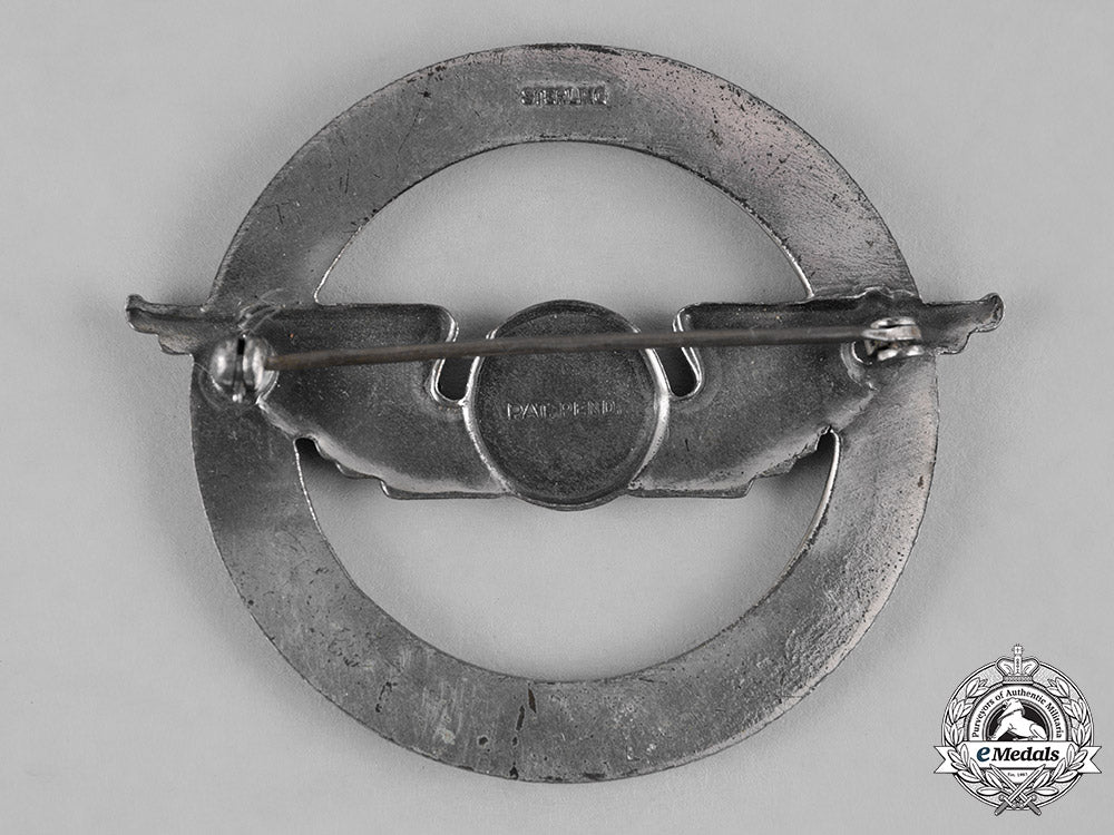 united_states._a_civil_aeronautics_administration(_caa)_war_training_service_cap_badge_c19-1208