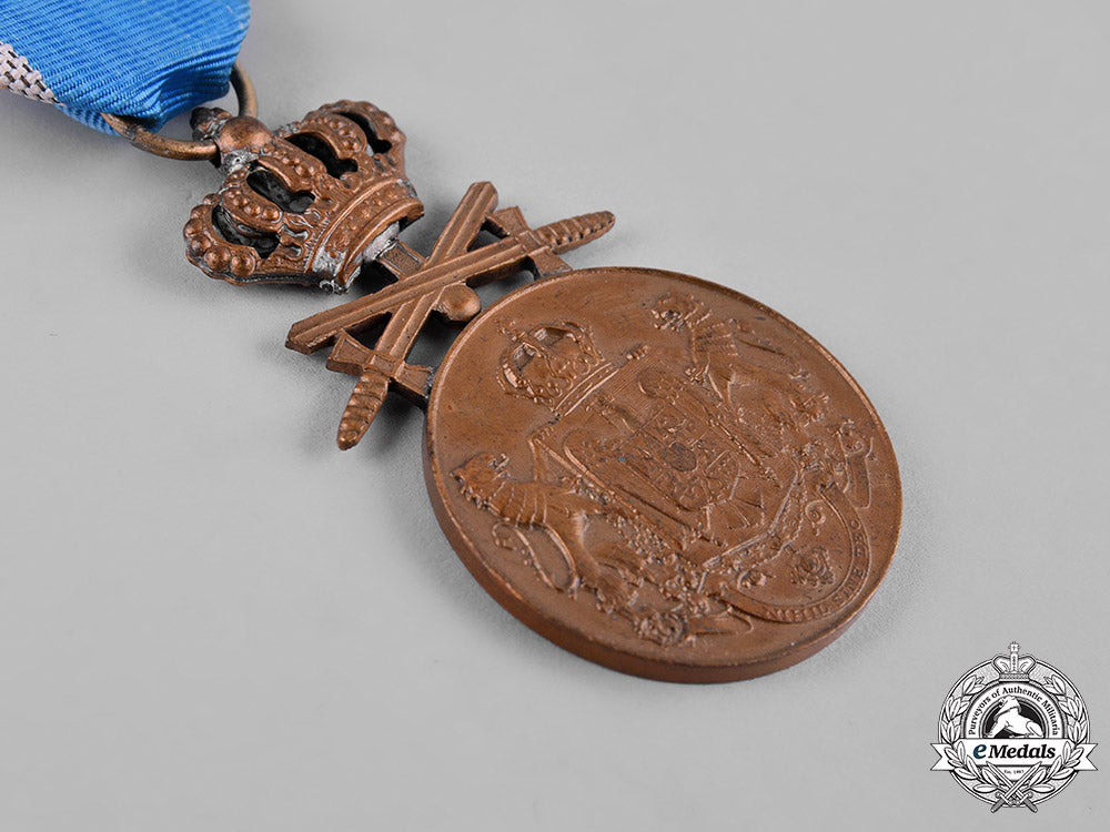 romania,_kingdom._a_long_service_medal,_iii_class_bronze_grade_with_swords,_c.1940_c19-6534