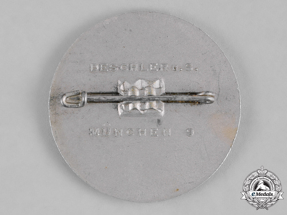 germany,_third_reich._a1939_blood_and_soil_leipzig_exhibition_badge,_by_deschler&_sohn_c19-7839