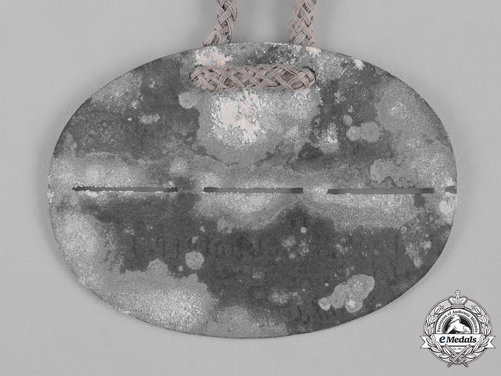 germany,_imperial._a_first_war_period_identification_tag_for_gefreiter_karl_maus_c19_0348