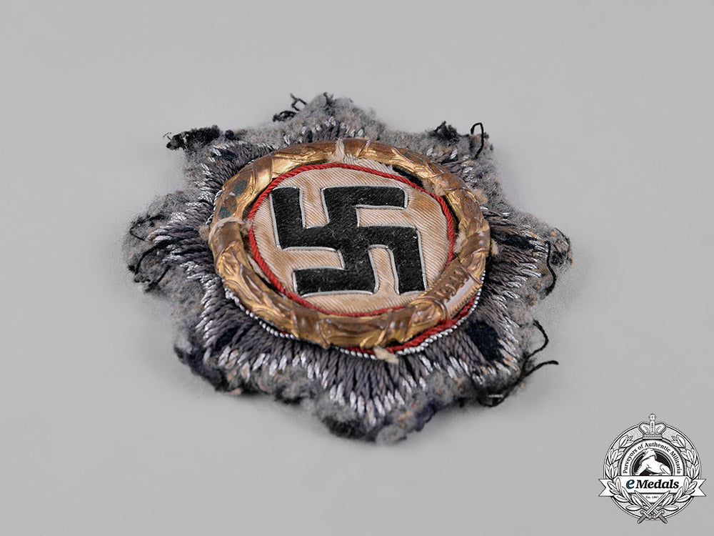 germany,_wehrmacht._a_german_cross_in_gold,_cloth_version_c19_0455_1_1