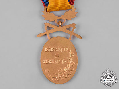 romania,_kingdom._a_medal_for_manhood_and_loyalty_with_crossed_swords,_i_class_c19_2996